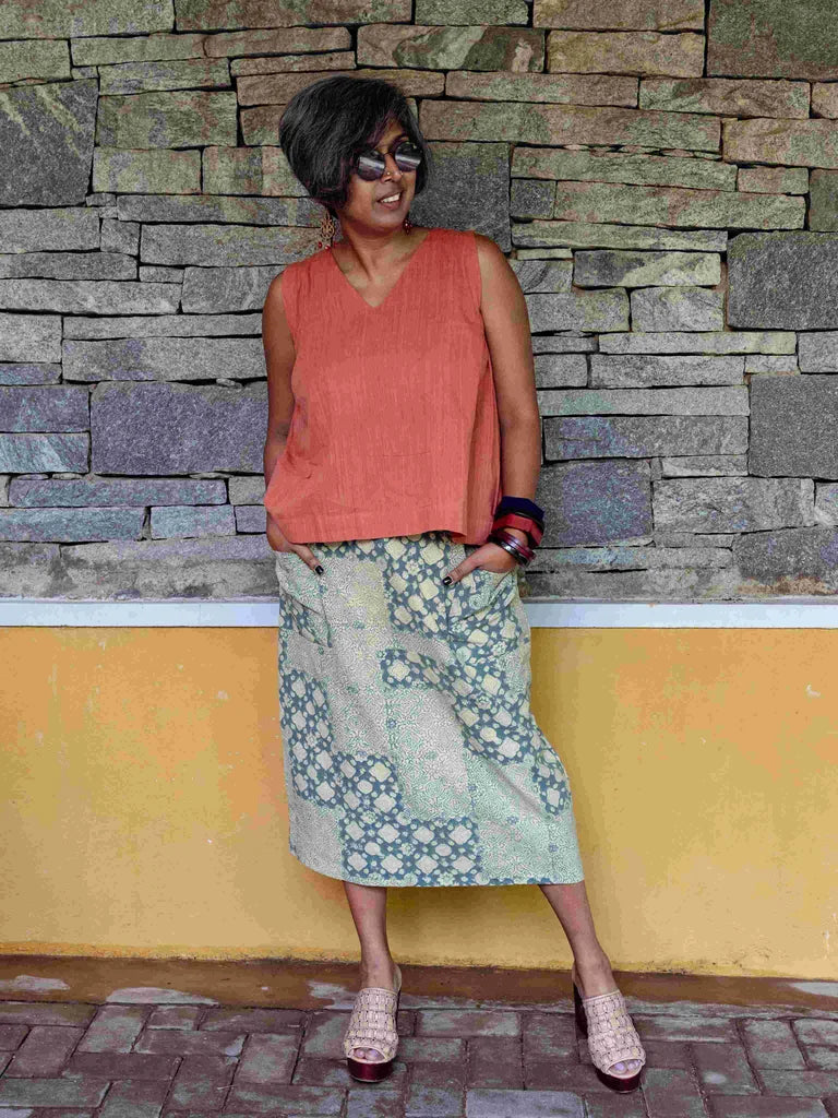 sleeveless tops with wide legged pants